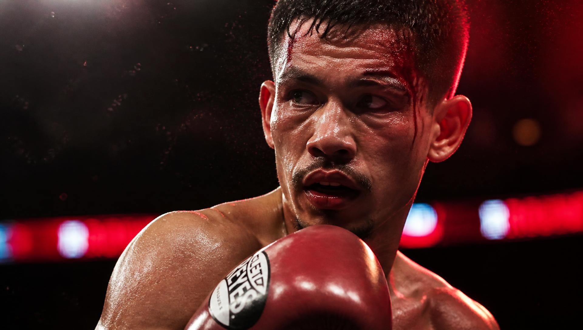 Boxer under arena lights between rounds